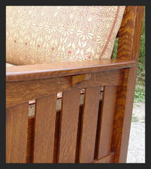 Close-up of arm, slats and corbel under the arm.